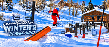 Cuchara Mountain Park, Winter’s Playground, Cuchara Colorado, Colorado ski resort, southern Colorado skiing, snowboarding, snowboarder action shot, terrain park, snowboard terrain features, snowboarding jumps, snowboarding obstacles, freestyle snowboarding, beginner snowboard terrain, ski and snowboard park, winter sports, Colorado winter activities, family-friendly ski resort, ski lift, chairlift, ski lift towers, mountain lodge, rustic ski lodge, snow-covered evergreen trees, snowy aspen trees, fresh pow