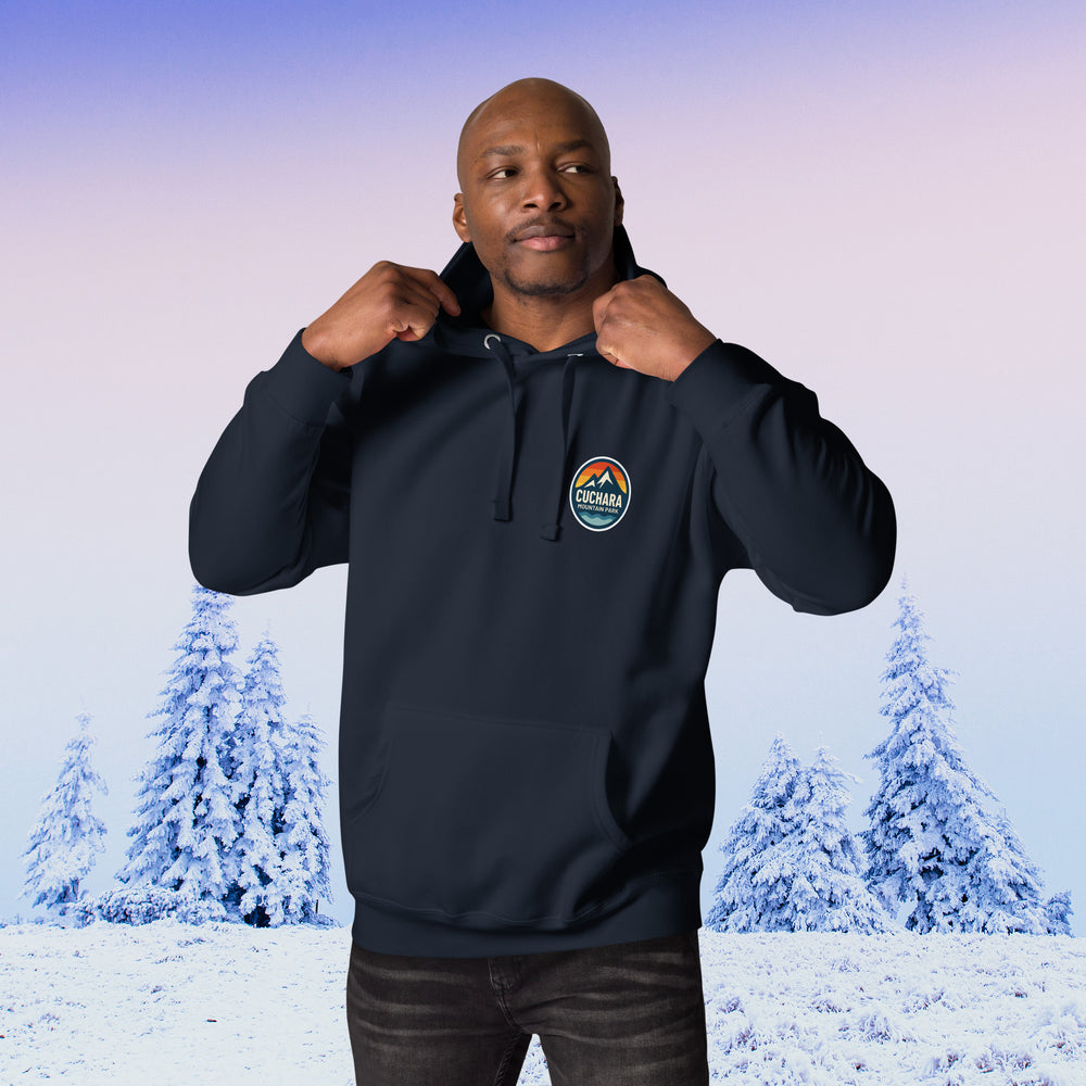 Cuchara Mountain Park hoodie, Cuchara Mountain Park logo apparel, Cuchara Mountain Park sweatshirt, Colorado ski resort hoodie, softest hoodie ever, ring-spun cotton polyester blend hoodie, high-altitude hoodie, Colorado mountain apparel, rugged adventure gear, Colorado ski area clothing, winter escape clothing, Colorado hiking hoodie, high-altitude clothing, former Cuchara Mountain Park ski area, Sangre de Cristo Mountains, Southern Colorado, best hoodie for cold weather, warm ski trip hoodie